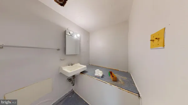 a view of a living room and hardwood floor