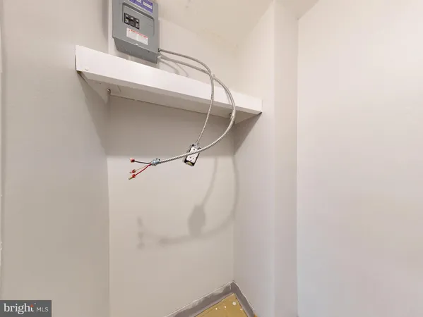 a view of a building with car parked