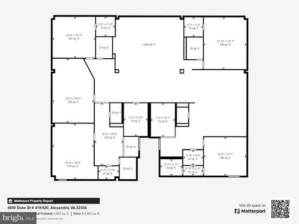 a view of a cars park in front of a building