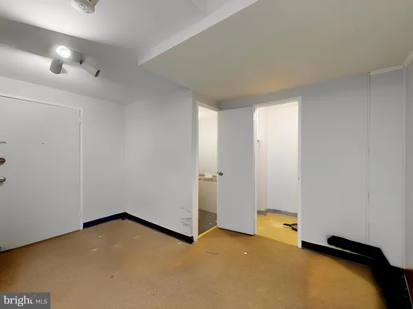 a view of a livingroom with furniture and wooden floor