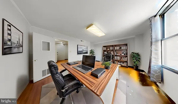 a view of a livingroom with furniture and a rug