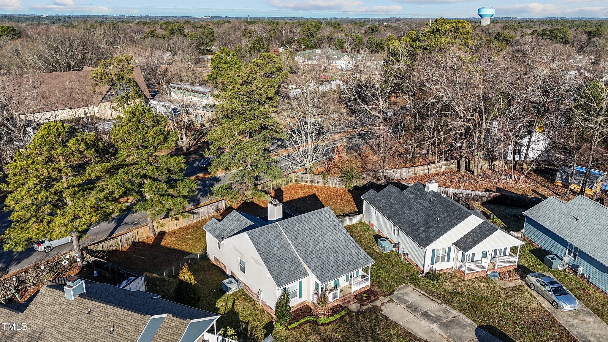 4101 Cobble Court Raleigh, NC 27616 - Photo 23 of 35 an aerial view of a house with a yard
