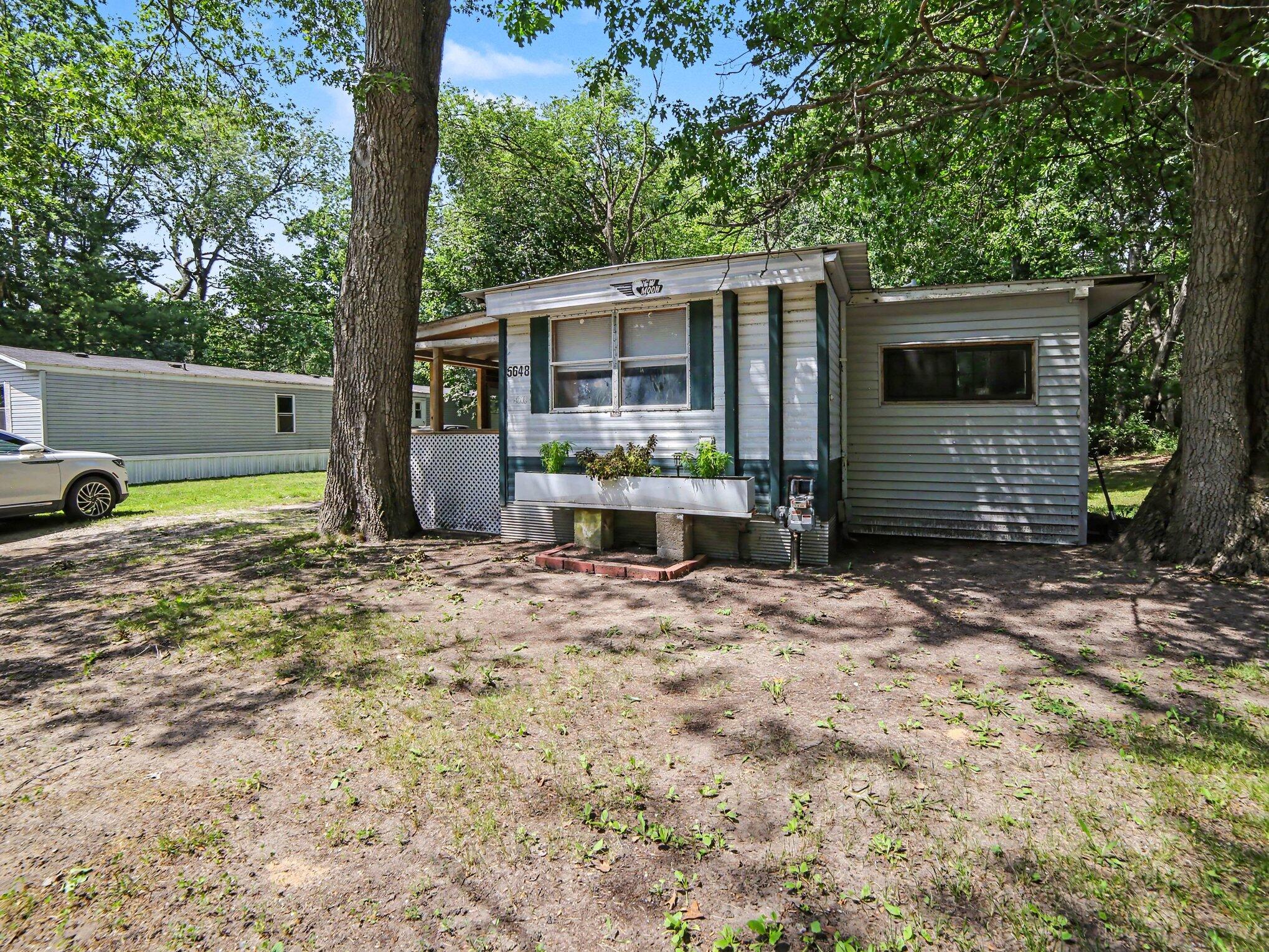 5648 West Johnson Road Ludington, MI 49431 - Photo 1 of 22 Front of house