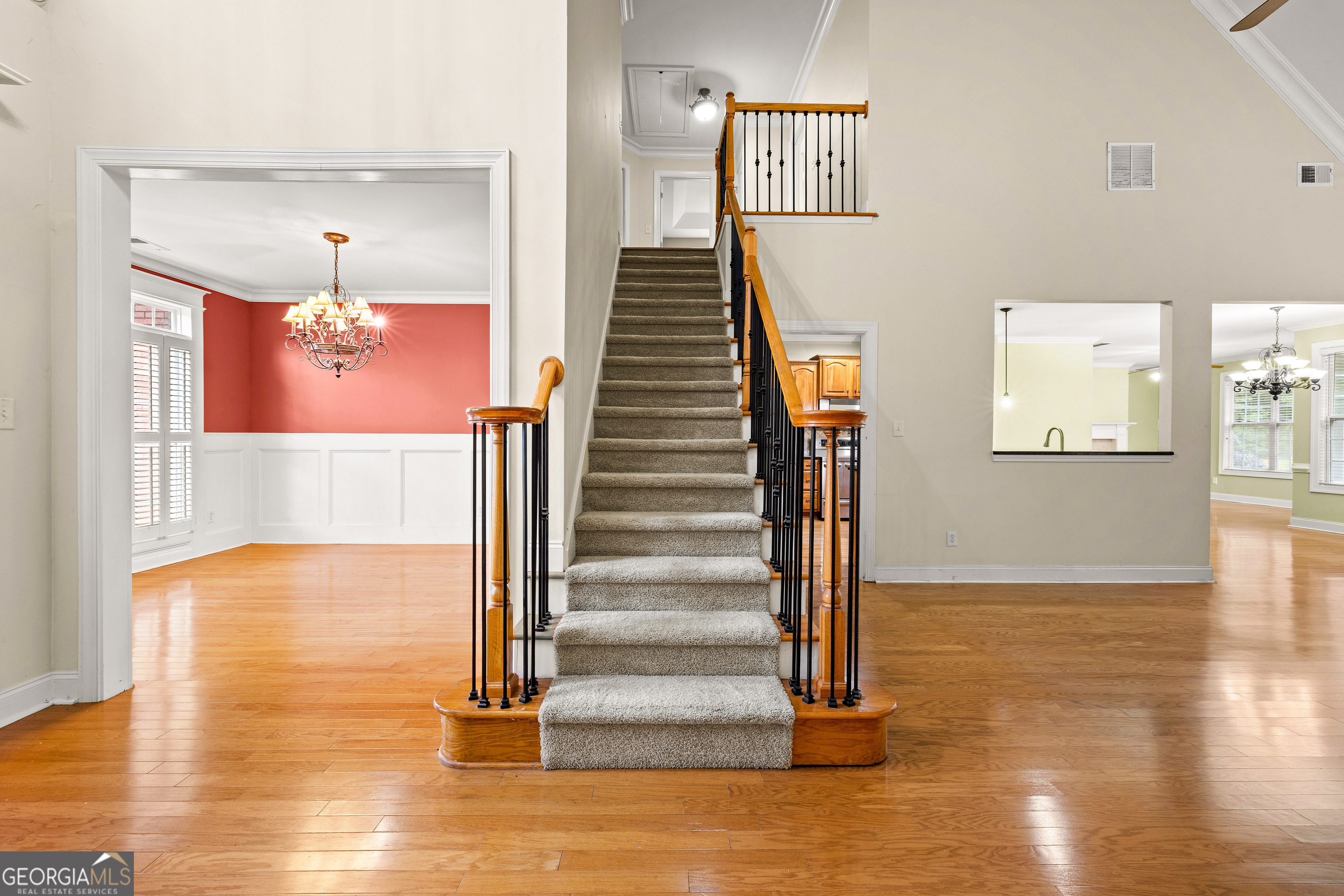 120 Shankhill Ridge Tyrone, GA 30290 - Photo 35 of 54 a view of a hallway with wooden floor and staircase