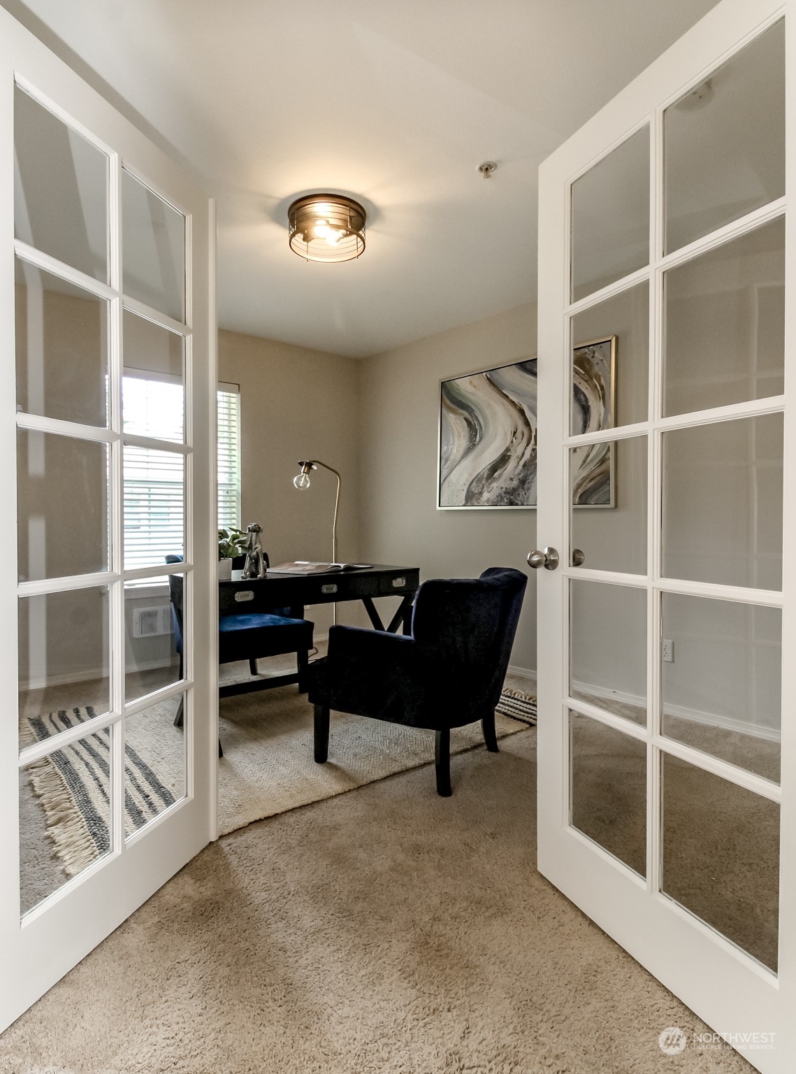 1607 Kincaid Street, Unit E8 DuPont, WA 98327 - Photo 13 of 28 a living room with furniture
