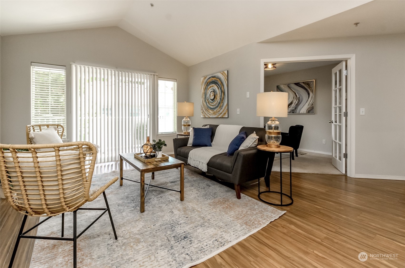 1607 Kincaid Street, Unit E8 DuPont, WA 98327 - Photo 7 of 28 a living room with furniture and wooden floor