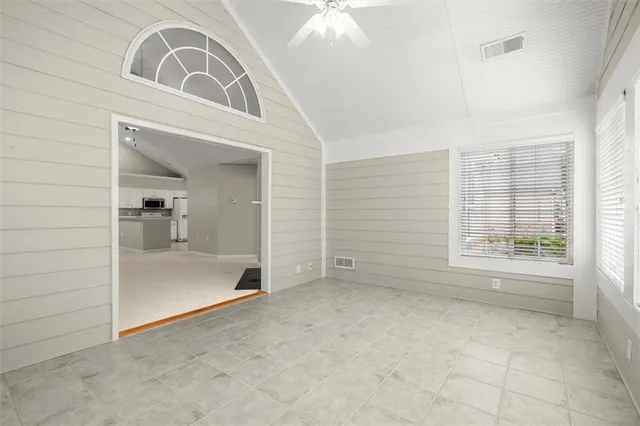 an empty room with a bathroom