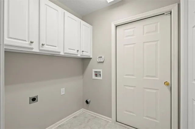 a view of outdoor space with signage and flags