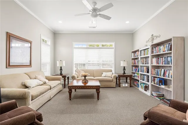 a view of a backyard with sitting area