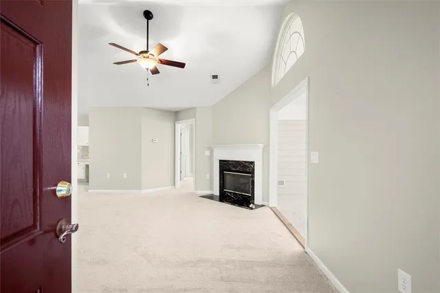 a view of a livingroom with a fireplace