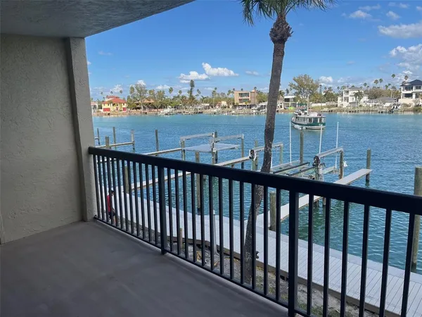 a view of a lake from a balcony