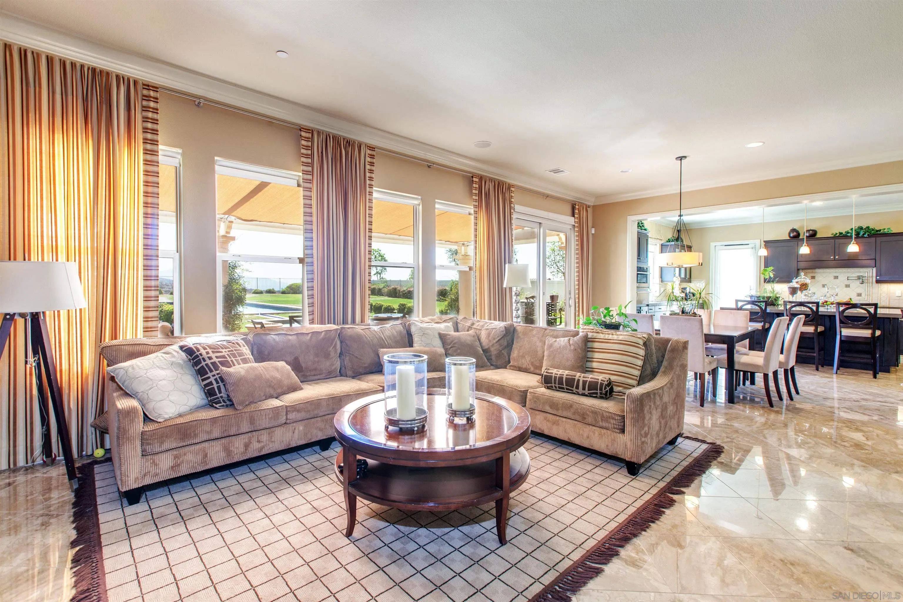 671 Via Maggiore Chula Vista, CA 91914 - Photo 12 of 42 a living room with furniture and a large window