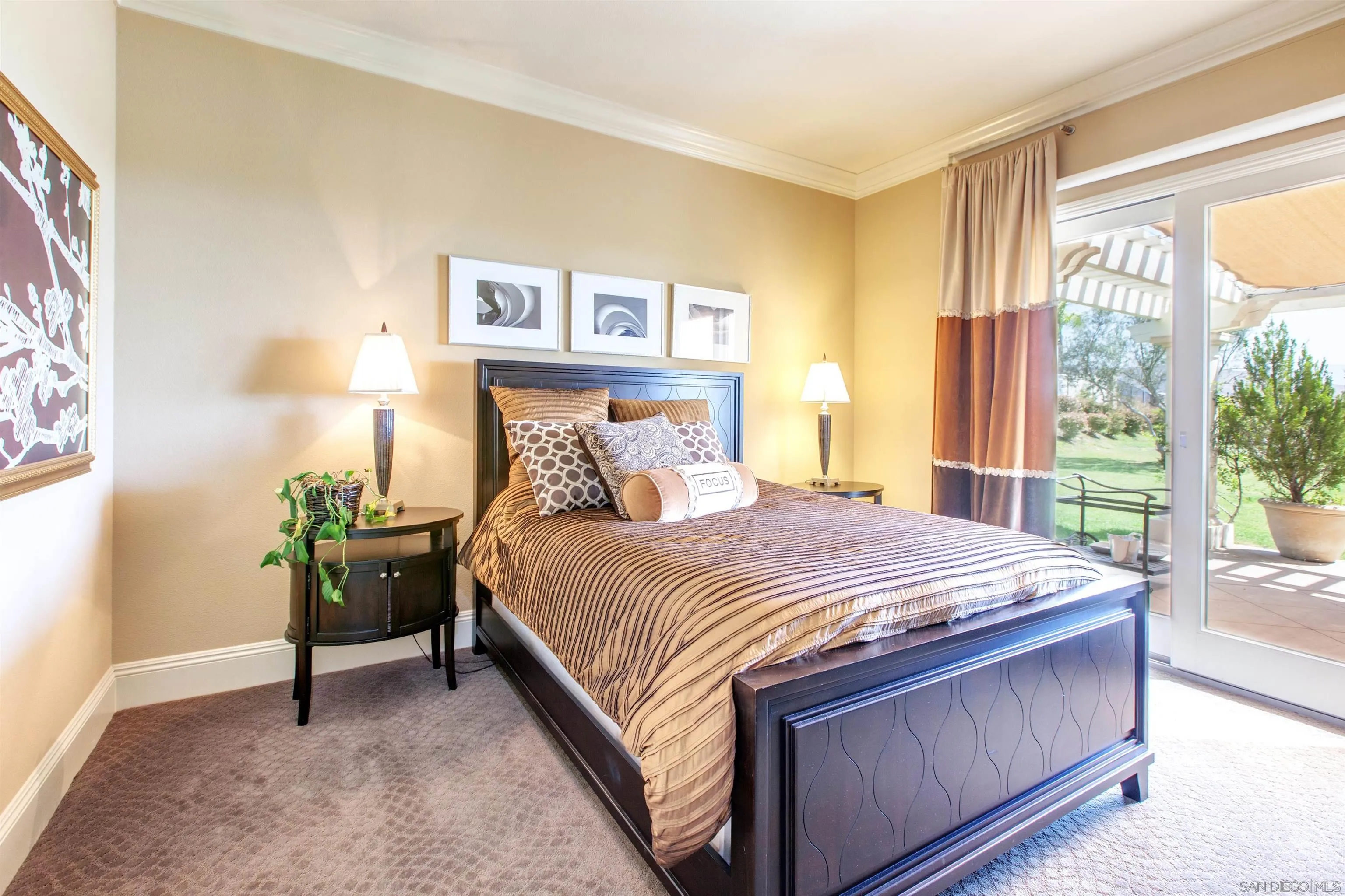 671 Via Maggiore Chula Vista, CA 91914 - Photo 18 of 42 a bedroom with a bed and a window