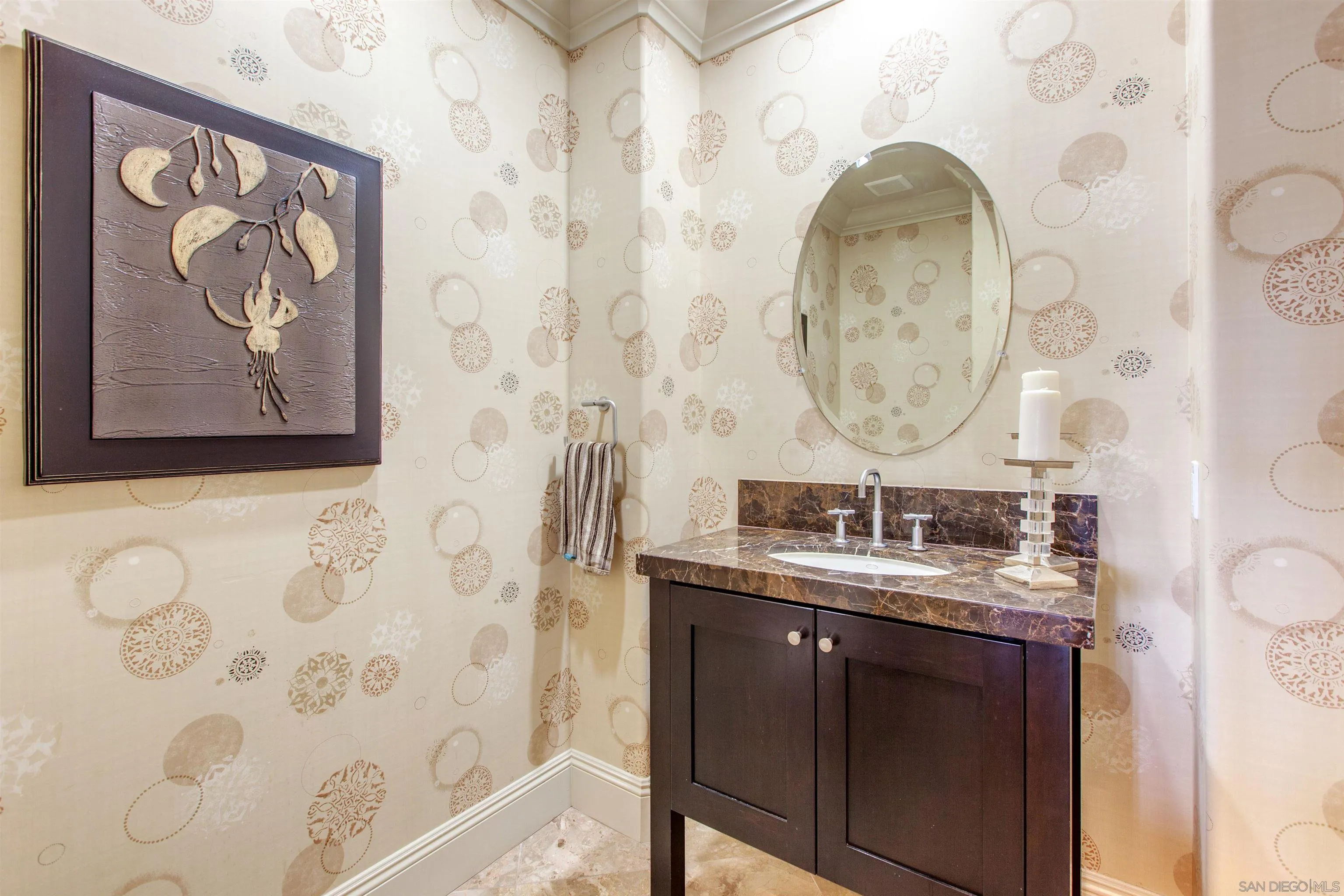 671 Via Maggiore Chula Vista, CA 91914 - Photo 20 of 42 a bathroom with a sink and a mirror