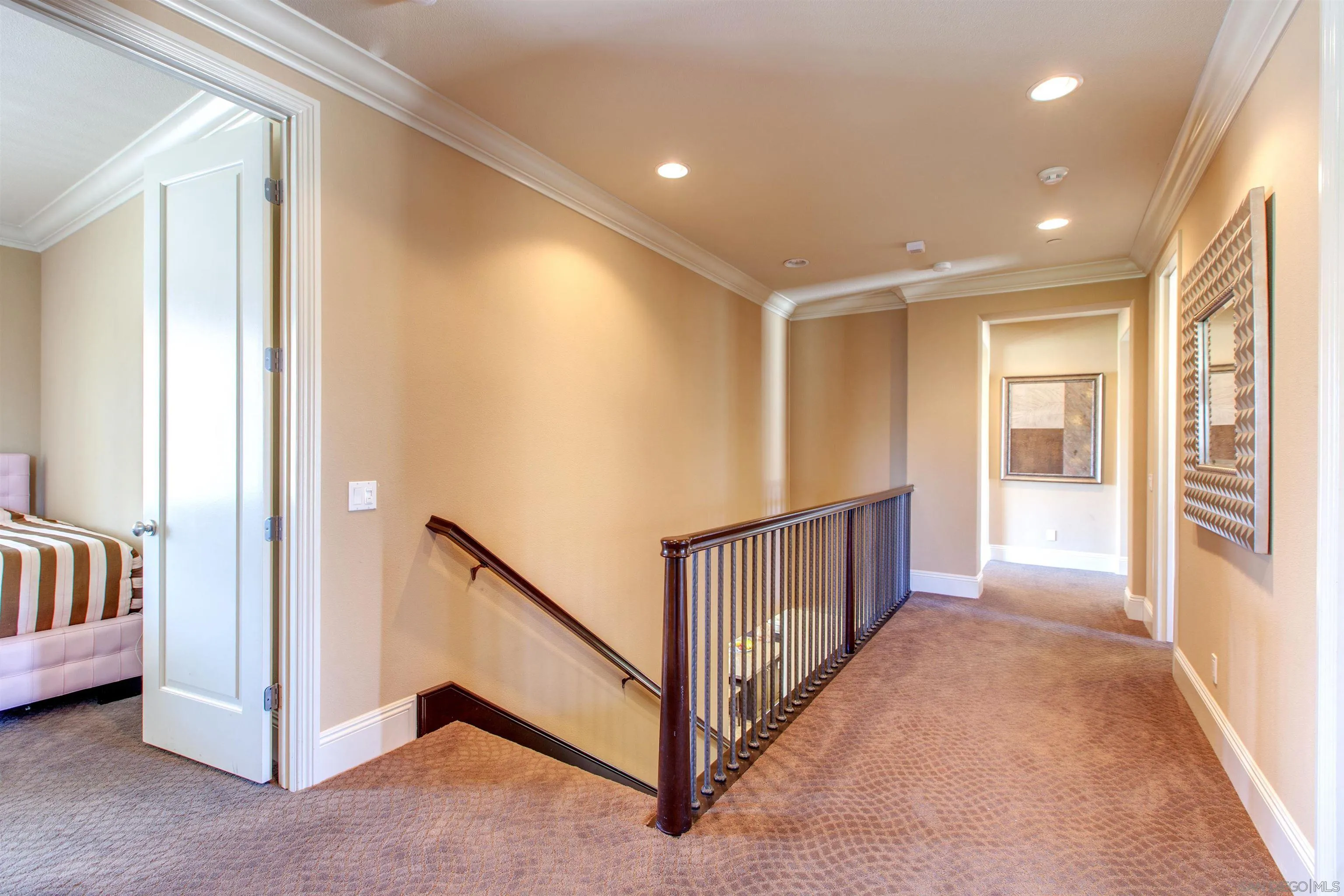 671 Via Maggiore Chula Vista, CA 91914 - Photo 21 of 42 a view of a hallway with windows