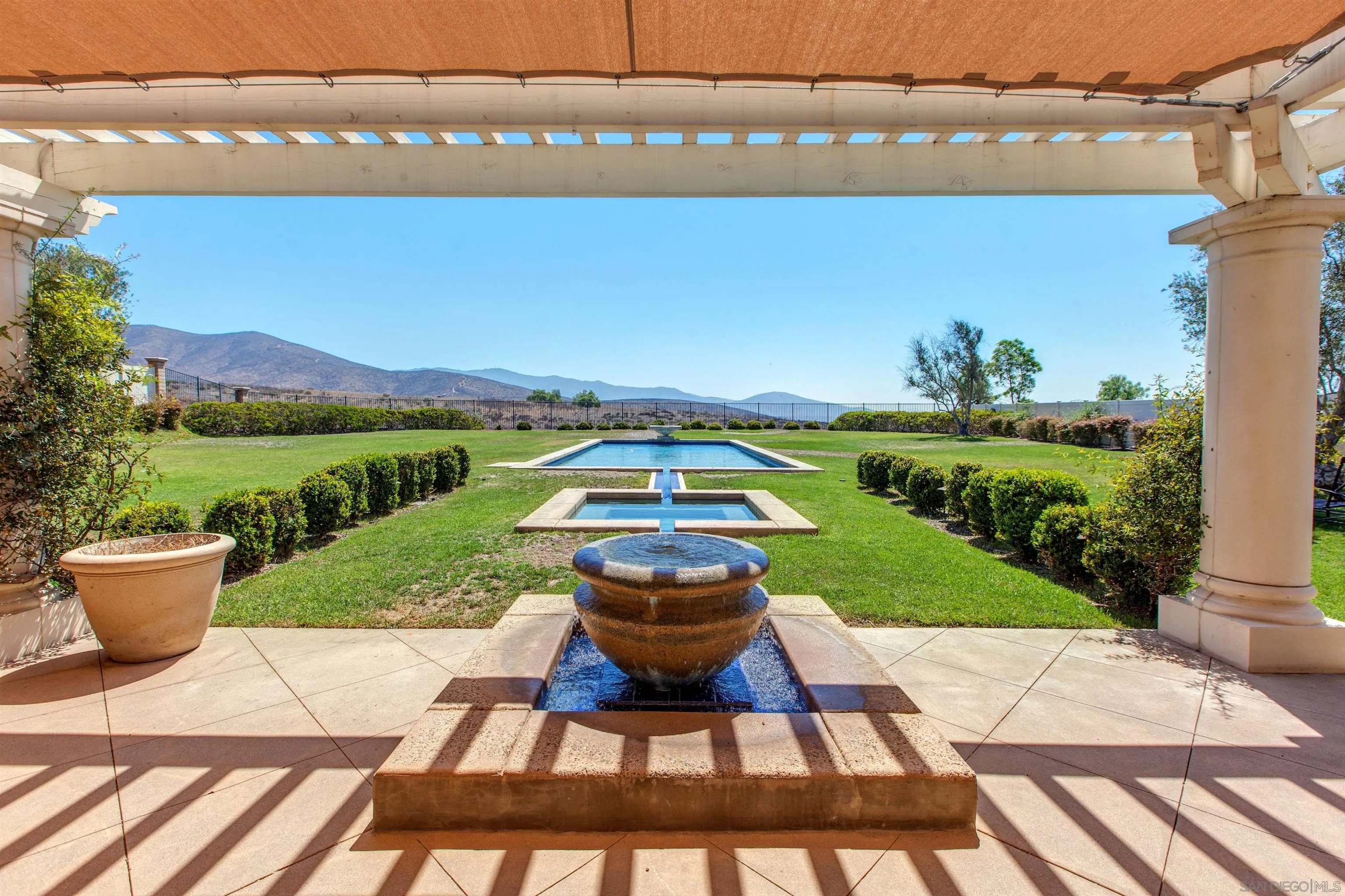 671 Via Maggiore Chula Vista, CA 91914 - Photo 33 of 42 a view of a backyard with sitting area