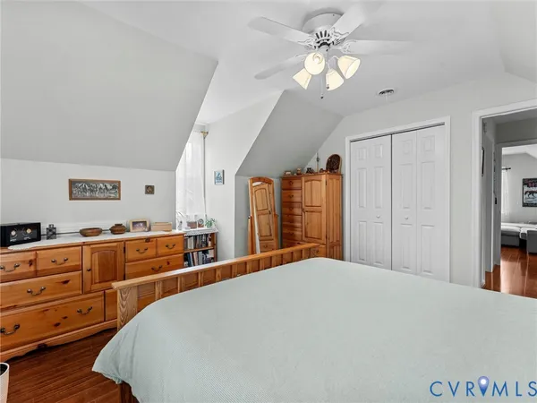 a wooden bench sitting in middle of the garden