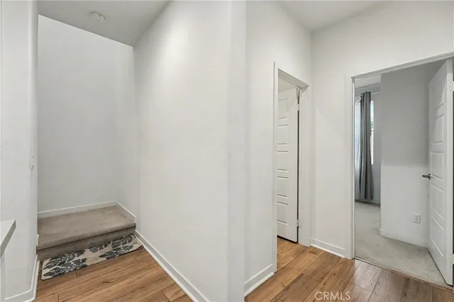 a bed room with furniture and a window