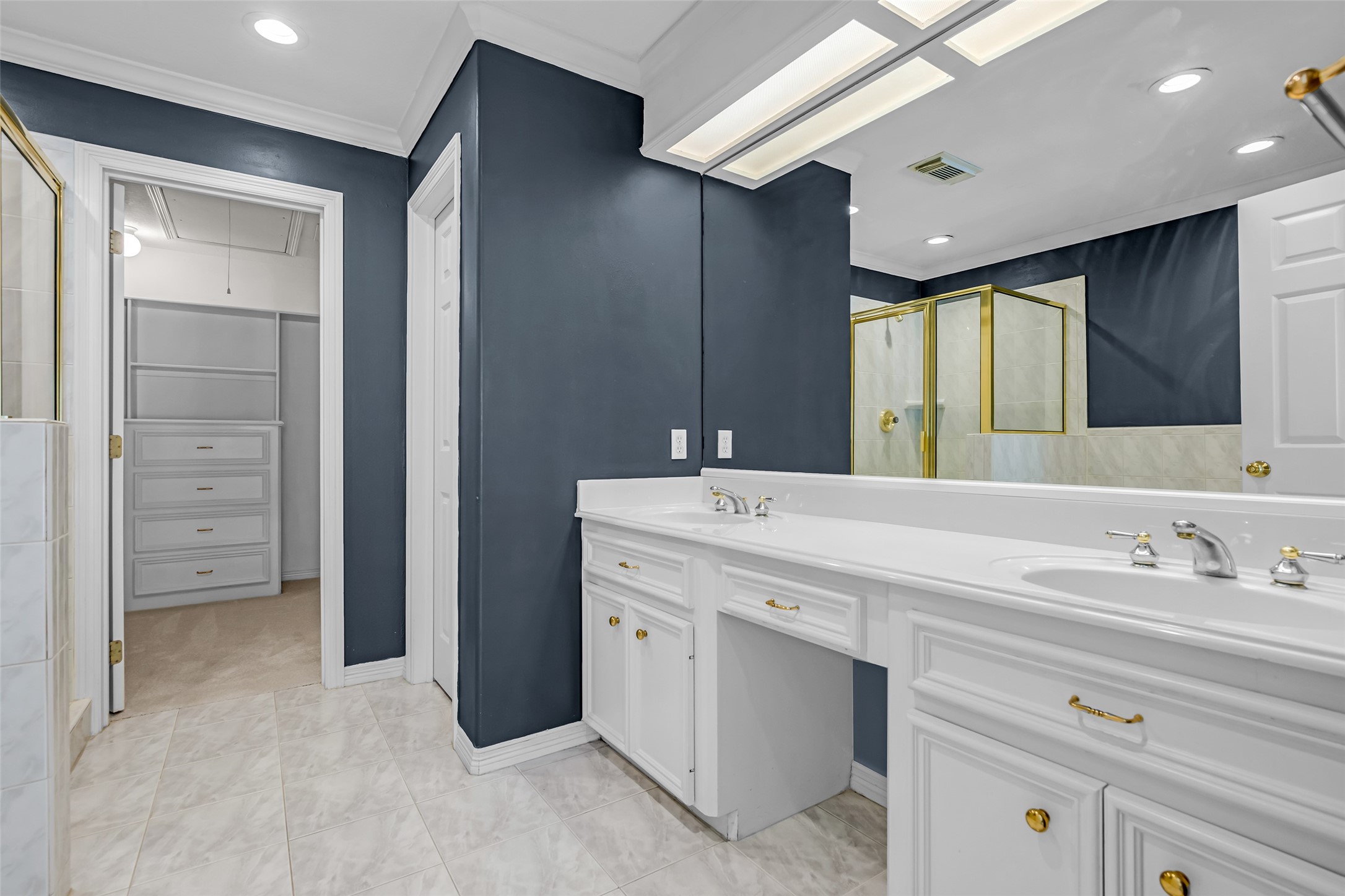 4916 Travis Street Houston, TX 77004 - Photo 16 of 27 a bathroom with a sink double vanity and a mirror