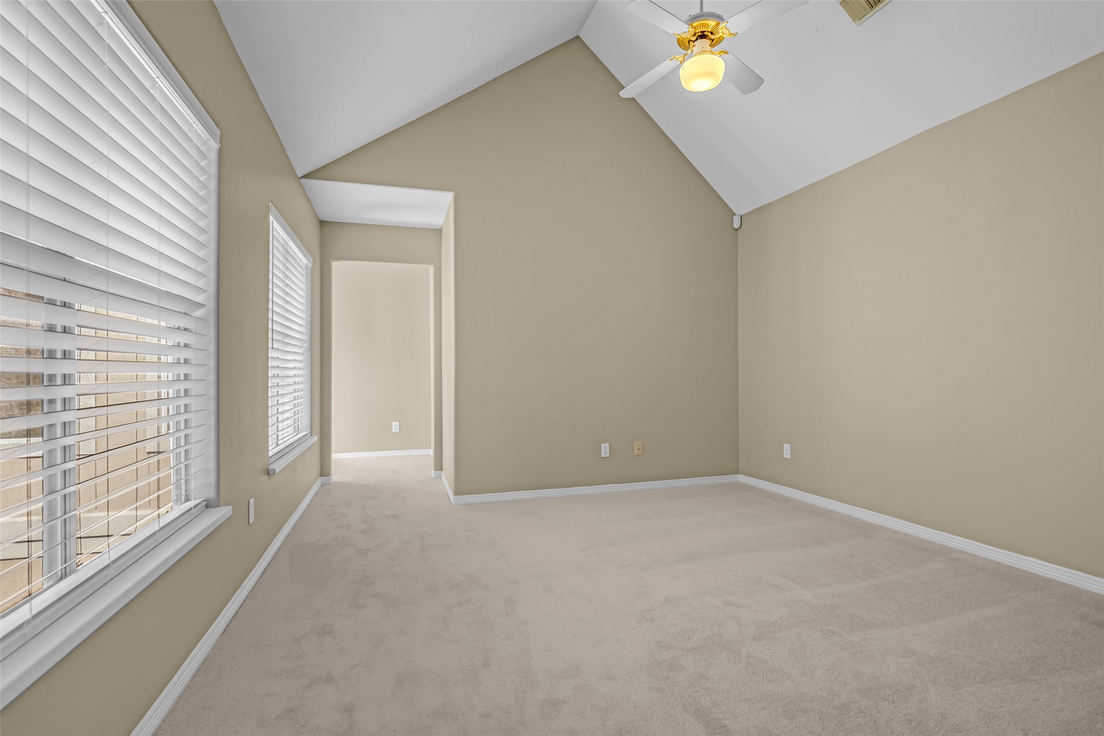 4916 Travis Street Houston, TX 77004 - Photo 18 of 27 a view of an empty room with a window