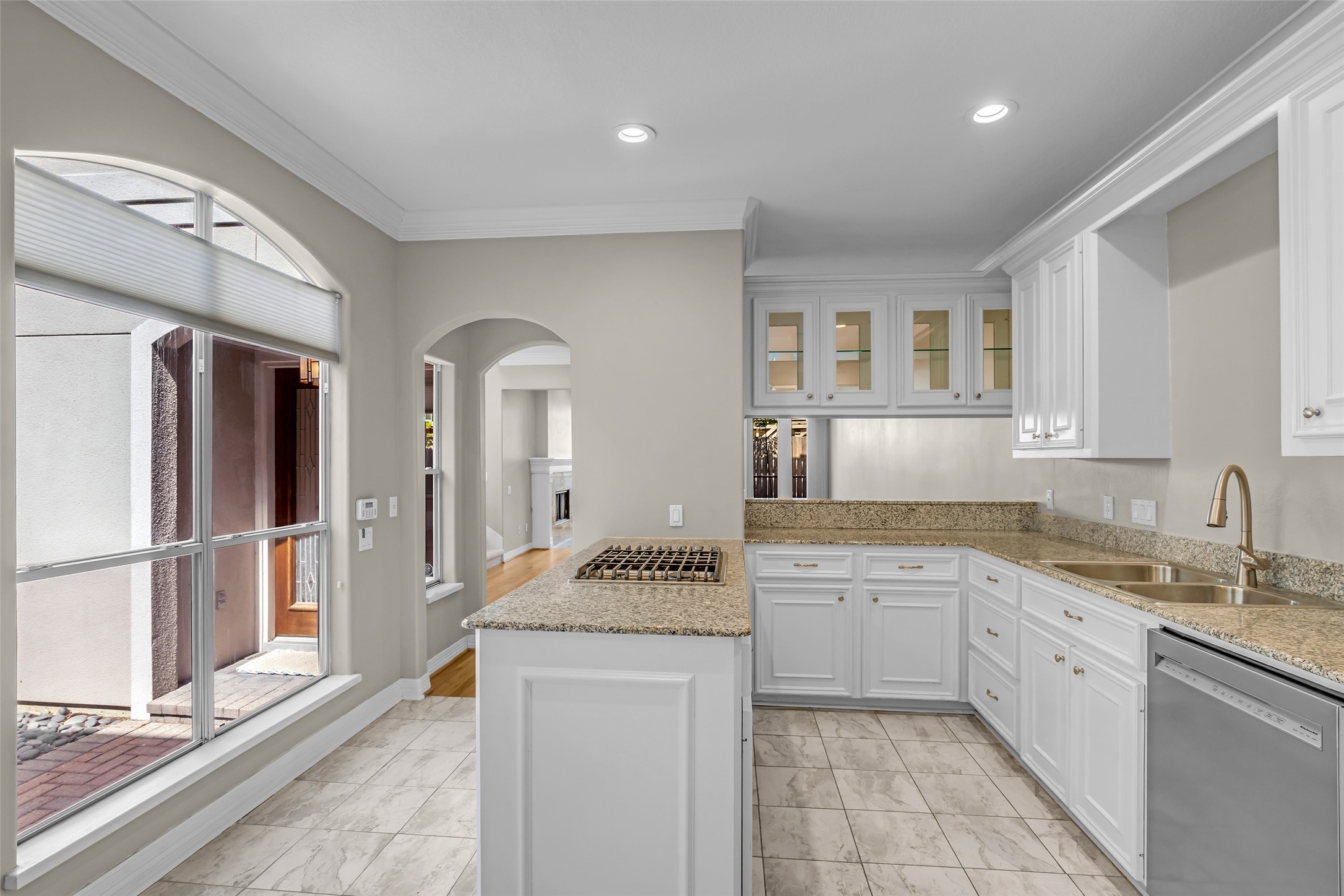 4916 Travis Street Houston, TX 77004 - Photo 10 of 27 a kitchen with a sink stove and cabinets