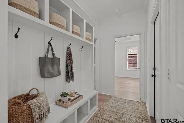 a bedroom with a bed and walk in closet