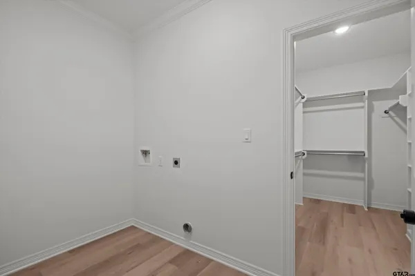 a view of an empty walk in closet