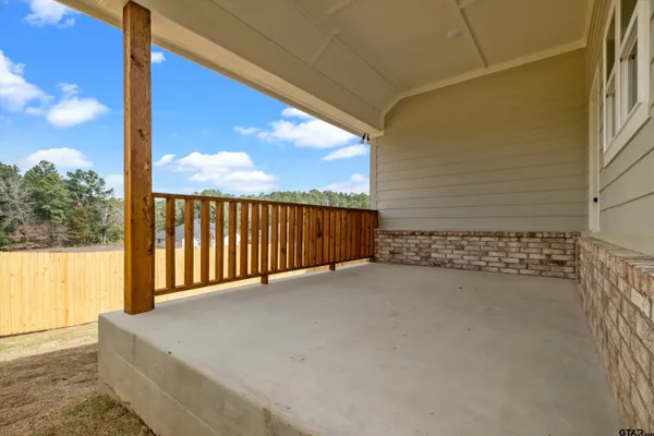 a view of a balcony with an outdoor space