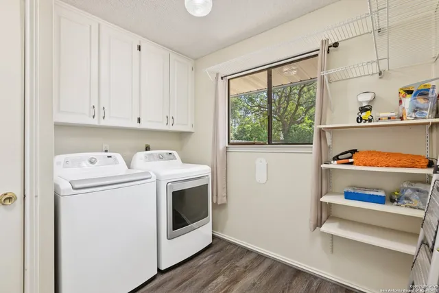 a utility room with dryer and washer