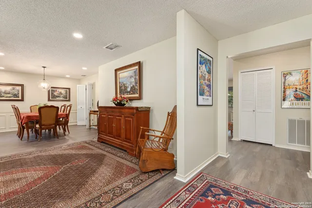 a living room with furniture and a table
