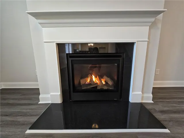 a living room with a fireplace