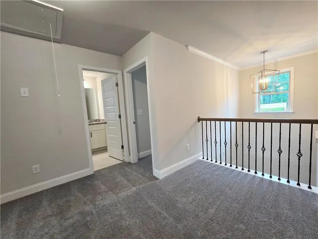 a view of a hallway with closet area
