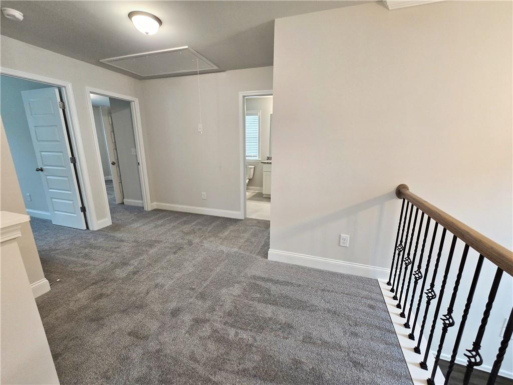 3856 Lockaby Way Lawrenceville, GA 30044 - Photo 28 of 36 an empty room with windows