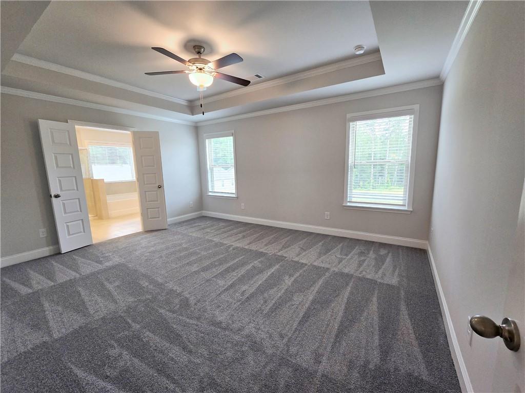 3856 Lockaby Way Lawrenceville, GA 30044 - Photo 29 of 36 a view of an empty room with a window