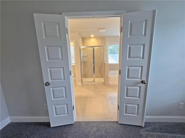 a view of an entryway with a door