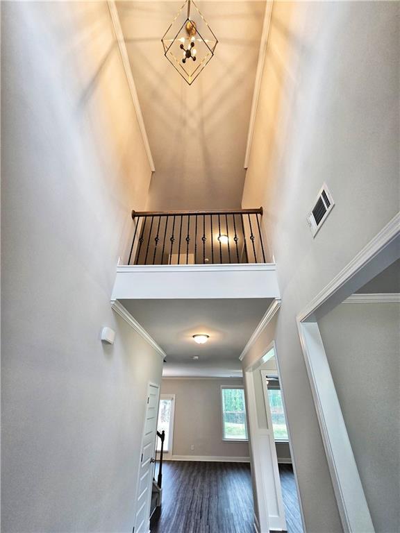 3856 Lockaby Way Lawrenceville, GA 30044 - Photo 6 of 36 a view of entryway and hall with wooden floor
