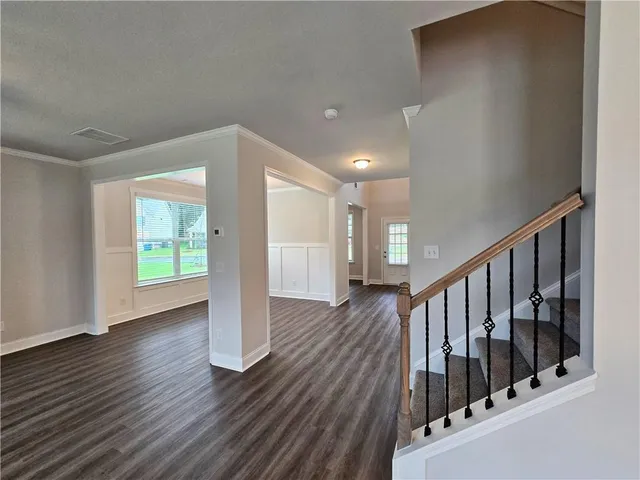 a view of entryway with wooden floor