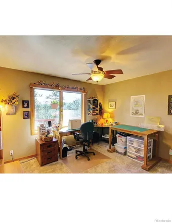 a view of living room with furniture and a flat screen tv