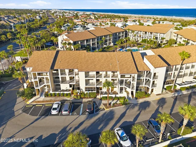 a view of a street with cars