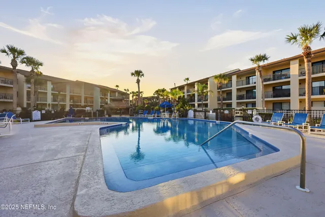 a front view of a house with swimming pool
