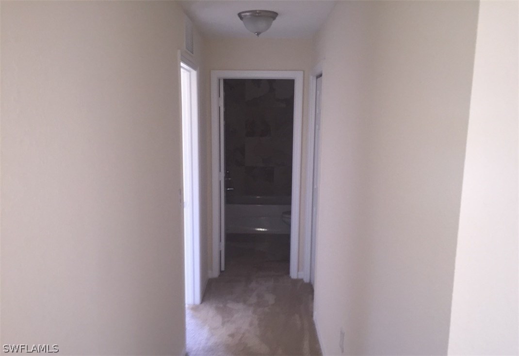 11890 Shawnee Road Fort Myers, FL 33913 - Photo 11 of 21 a view of a hallway