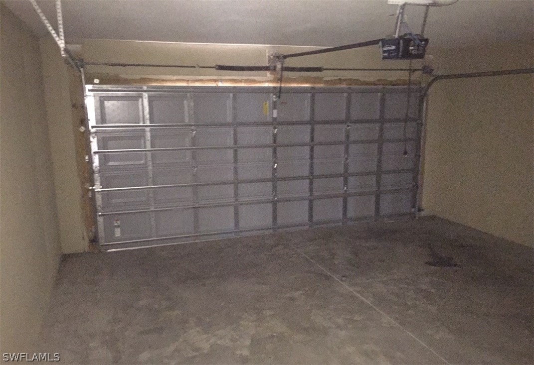 11890 Shawnee Road Fort Myers, FL 33913 - Photo 18 of 21 a view of a room with racks on the wall