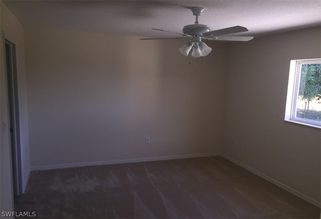 11890 Shawnee Road Fort Myers, FL 33913 - Photo 21 of 21 a view of a room with a window