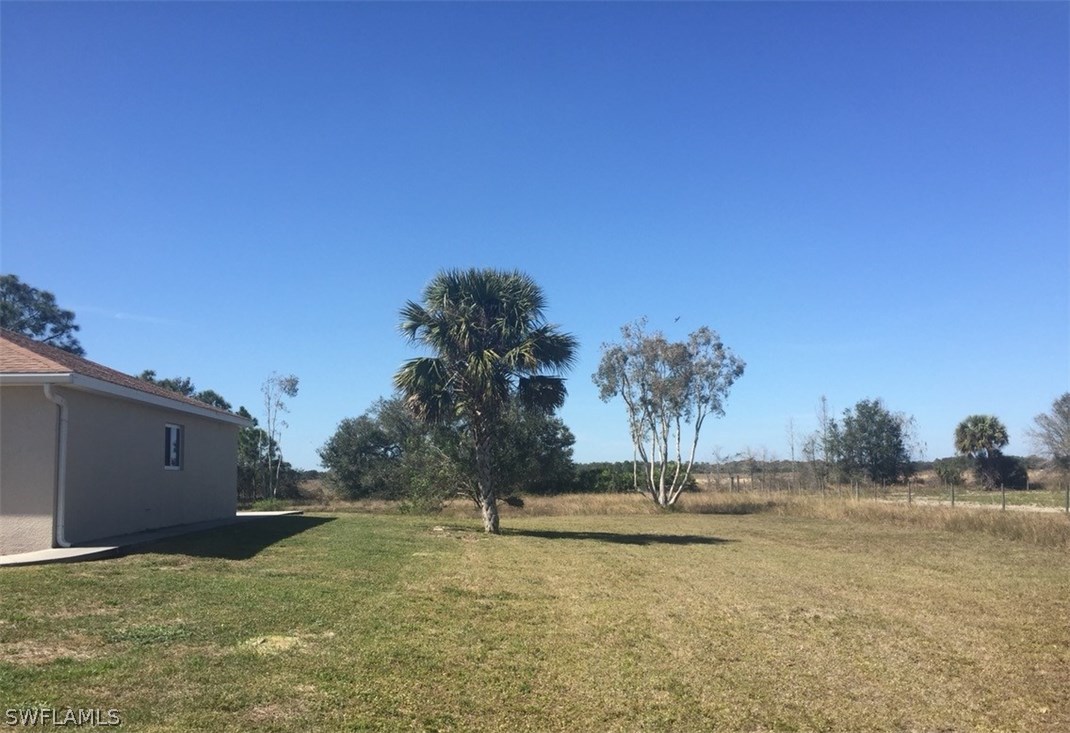 11890 Shawnee Road Fort Myers, FL 33913 - Photo 3 of 21 a view of a lake