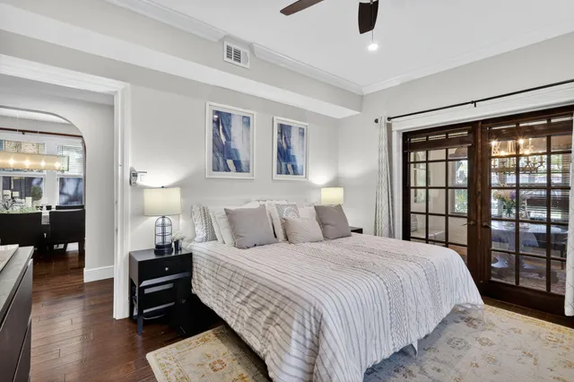 a bedroom with a bed and window