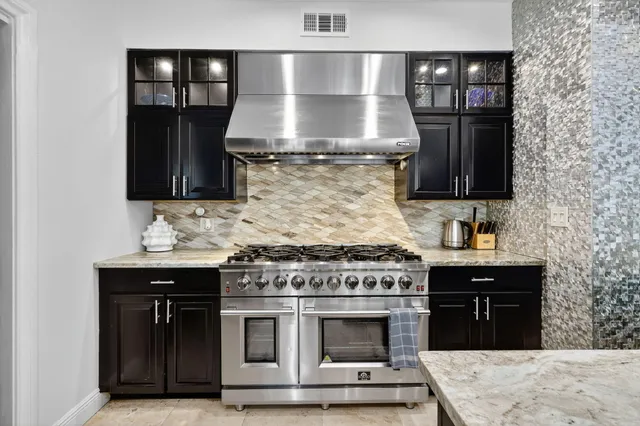 a view of a swimming pool with an outdoor space and seating area