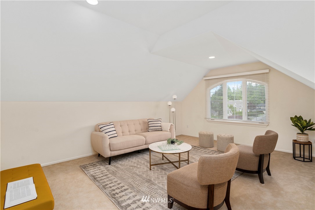 2512 204th Street Southeast Bothell, WA 98021 - Photo 22 of 37 a living room with furniture and a window