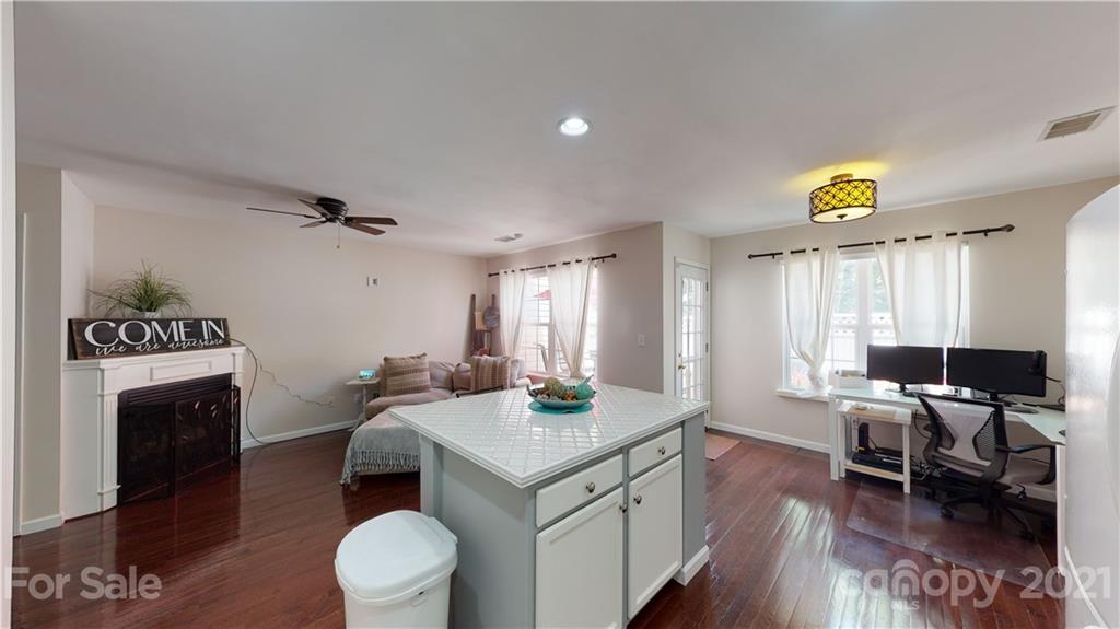 11642 Rabbit Ridge Road Charlotte, NC 28270 - Photo 14 of 45 a view of a dining room with furniture window and wooden floor