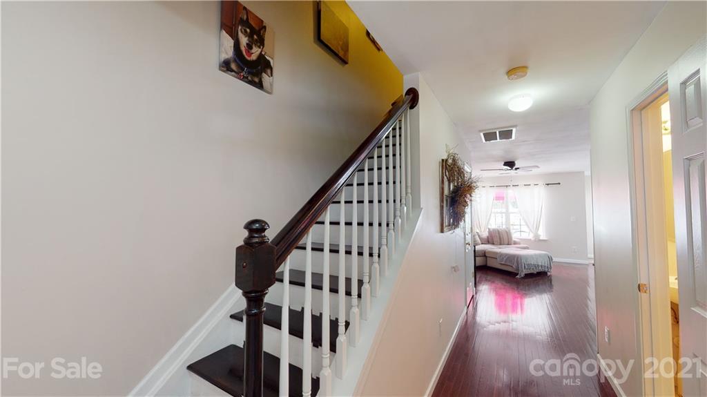 11642 Rabbit Ridge Road Charlotte, NC 28270 - Photo 16 of 45 a view of entryway and hall with wooden floor