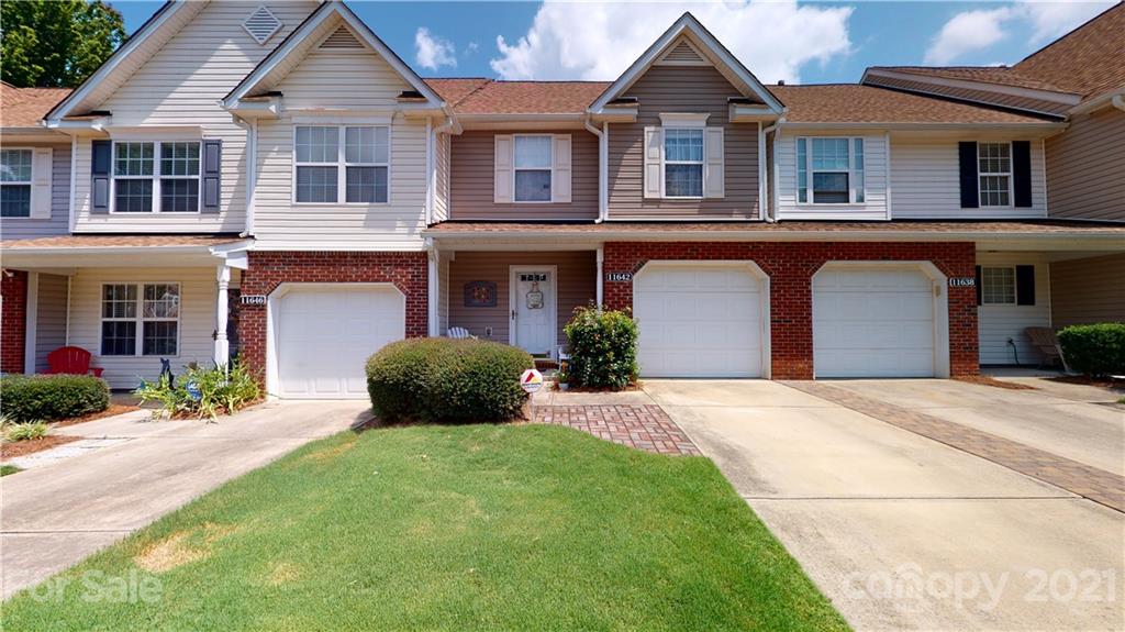 11642 Rabbit Ridge Road Charlotte, NC 28270 - Photo 3 of 45 front view of a brick house with a yard
